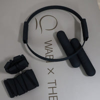 Black pilates accessories set on a milk tea oval mat  branding.